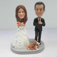 Personalized custom wedding cake with dog bobbleheads