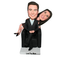 Husband in black suit and wife in coffee dress bobblehead
