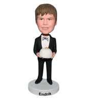 Young boy in black suit bobblehead