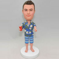 Personalized bobbleheads in blue beach shirt and shorts