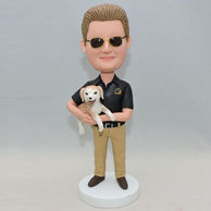 Custom bobblehead for husband with a dog in his hand