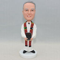 Personalized bobblehead with white cloke and a brown scarf