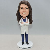 Friendly woman doctor bobblehead with dark blue outfit