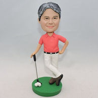 Personalized golf player bobblehead with three white ball on the green ground