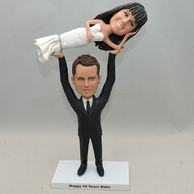 Personalized Couple Bobbleheads lifting his bride