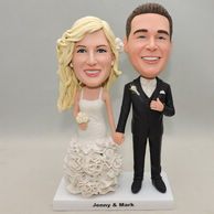 Personalized wedding bobbleheads hand in hand with sweet smile