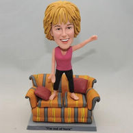 Woman bobblehead stand on sofa for funny