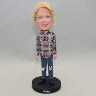 Little girl bobblehead with Plaid Shirt and big smile