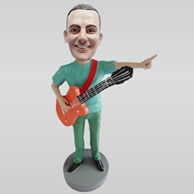 Personalized custom man and guitar bobble heads