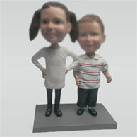 Custom sister and brother bobbleheads