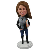 Custom sweet smile female standing with one hand in pocket, one hand holds a book in her arms bobble heads
