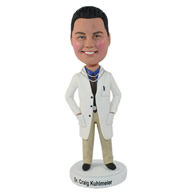 Custom male doctor in a normal work posture of hands into pockets bobble heads