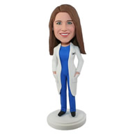 Custom female doctor in white coat blue suit underneath bobble heads