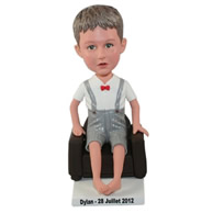 Custom barefeet little boy dressing in handsome clothes sitting in the chair bobble heads