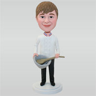 Man in white sweater holding a big spoon and a big bowl custom bobbleheads