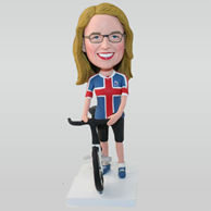 Custom woman bobblehead in flag pattern T-shirt with her bicycle