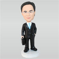 Business man in black suit holding a briefcase custom bobbleheads
