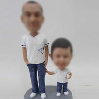 Dad and son bobble head doll