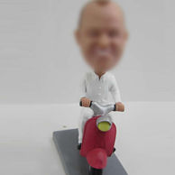 Man on a motorcycle bobble