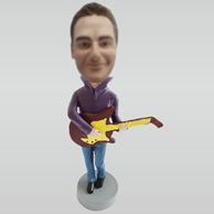 Custom man and guitar bobbleheads