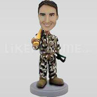 Bobblehead hunter holding a gun-11773