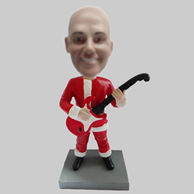 Custom Santa Claus and guitar bobbleheads