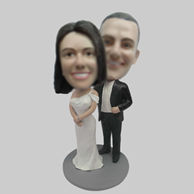 Custom wedding cake bobbleheads