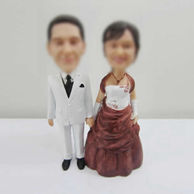 Customized wedding cake bobbleheads