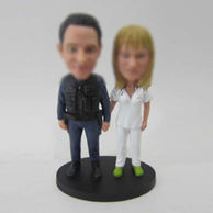 Customized bobble heads of wedding cake