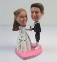Customized happiness wedding cake bobbleheads