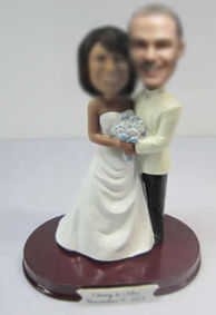 Customized happiness wedding cake bobble heads