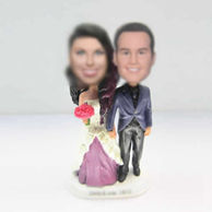 Customzed bobble heads of wedding cake