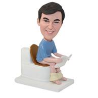 Personalized custom man sits on a toilet bobbleheads
