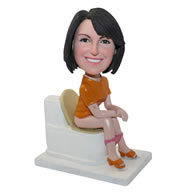 Personalized custom woman sitting on a toilet bobbleheads