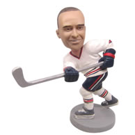 Personalized custom ice hockey player hitting ball bobbleheads