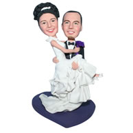 Groom in black suit carrying his bride in white wedding dress custom bobblehead