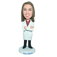 Long hair female doctor in doctor's overall bobblehead