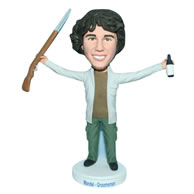 Black hair hunter handing a shotgun and a bottle bobblehead