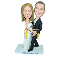 Groom in black suit and bride in white wedding dress bobblehead