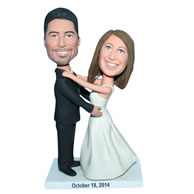 Groom in black suit and bride in white wedding dress bobblehead