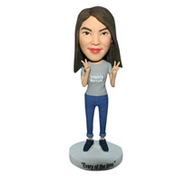 Smiling girl in grey shirt matching with jeans bobblehead