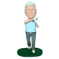 Man in blue shirt playing golf bobblehead