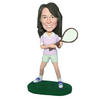 Long hair woman in pink shirt playing tennis bobblehead