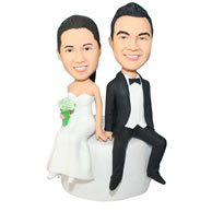 Groom in black suit and bride in white wedding dress bobblehead