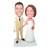 Groom in beige suit and bride in white wedding dress bobblehead