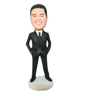 Handsome groomsman in black suit bobblehead