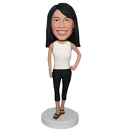 Sports woman in white est matching with black pants bobblehead