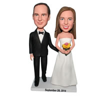 Groom in black suit and bride in white wedding dress bobblehead