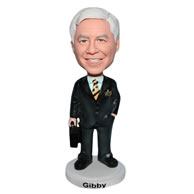 Business man in black suit bobblehead