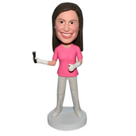 Female doctor handing a operating forceps bobblehead